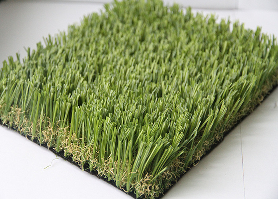 中国 高い伸縮性のサッカーの屋外の擬似草は20MM - 45MMの山の高さにカーペットを敷く サプライヤー
