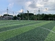 40mmの高さのフットボールの人工的な泥炭の絨毯を敷いた床のサッカーの草地の緑 サプライヤー