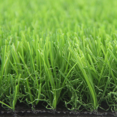 中国 庭の合成物質のための人工的な草に床を張って20-50mmの人工的な草を草でおおいなさい サプライヤー