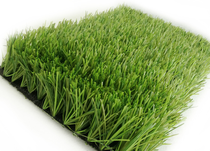 高水準のフットボール競技場のためのトリオ色18000Dtexの強く総合的な庭の人工的な草 1